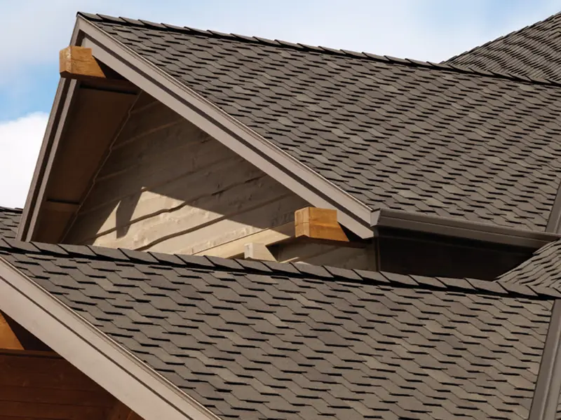 Owens Corning Woodmoor shingles on gables with wood beams