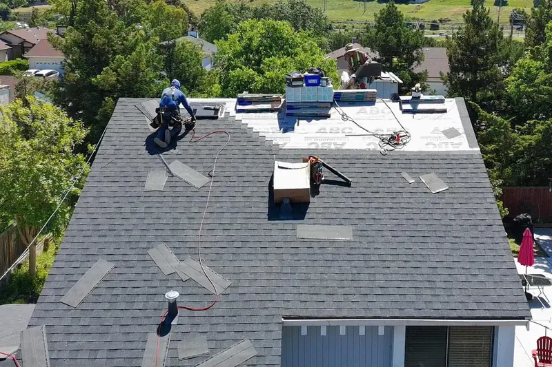 Roofer from Affordable Roofing Systems nailing CertainTeed Landmark shingles in staggered rows in Hercules, CA